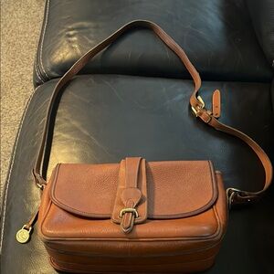 Classic Brown Leather Dooney and Bourne cross body saddle bag
